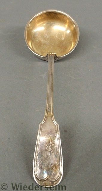 Silver ladle in a Colonial