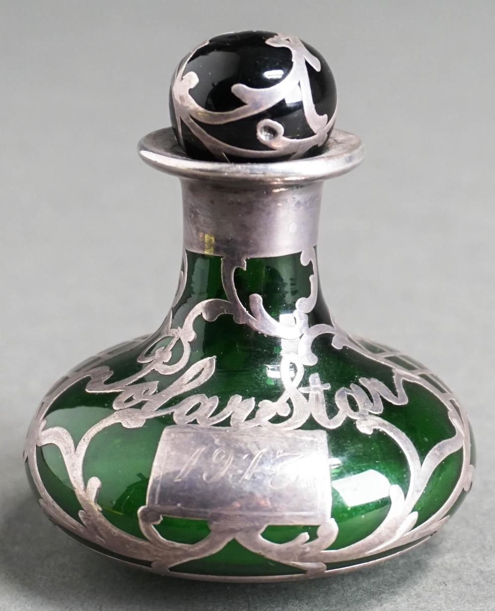 SILVER MOUNTED GREEN GLASS