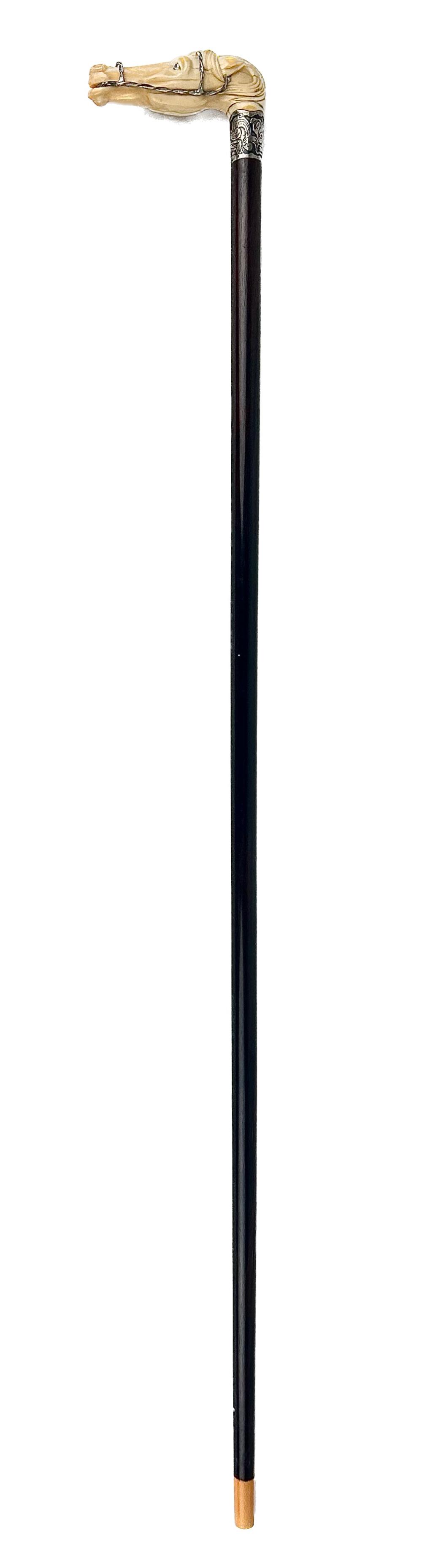 SILVER-MOUNTED HORSE HEAD CANE LATE