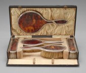Silver-mounted tortoise dresse