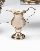 Silver pear-shaped creamer by