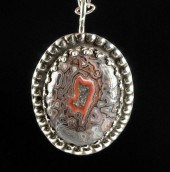 SILVER PENDANT W/ FOSSILIZED D