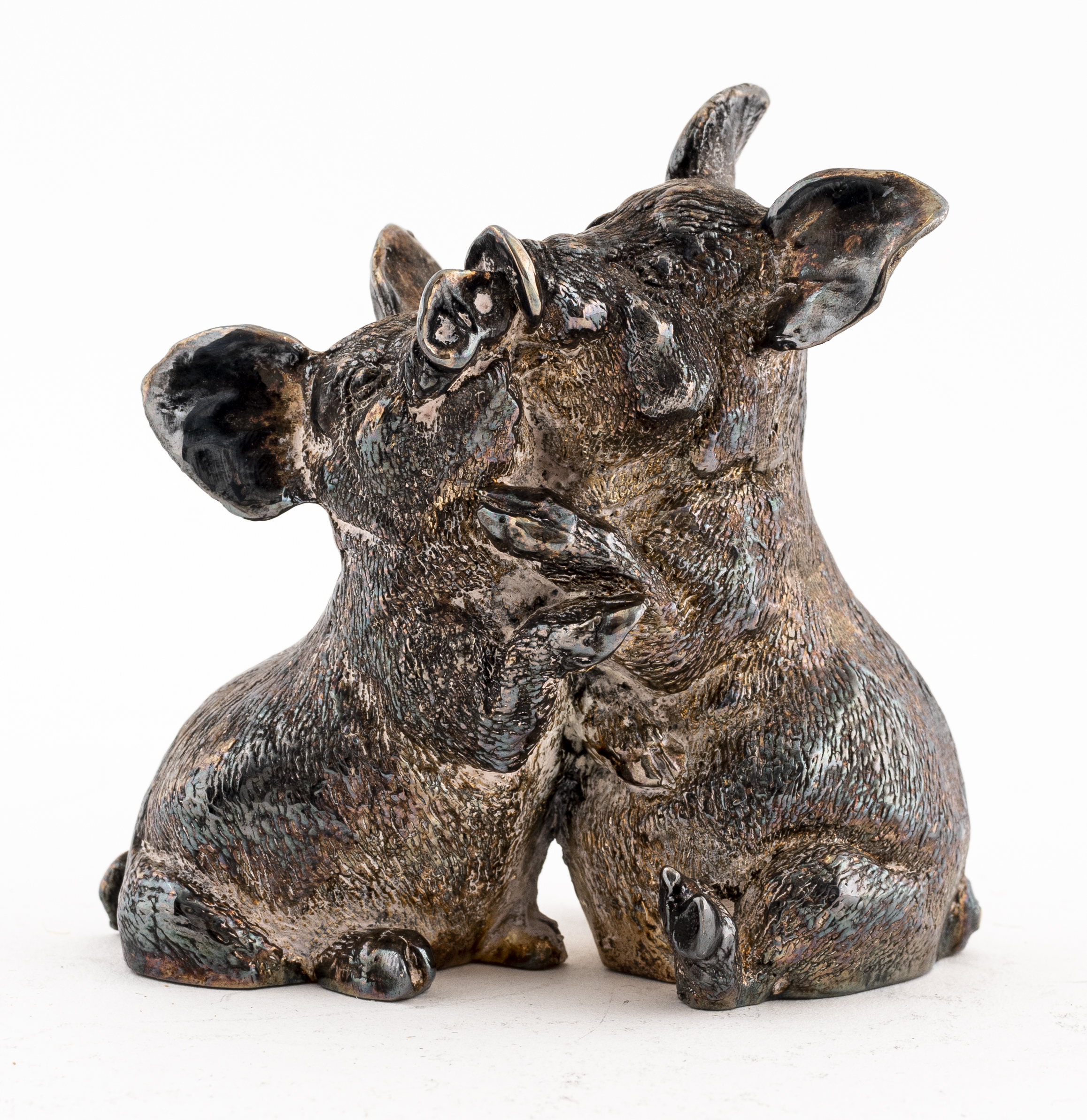 SILVER-PLATE FIGURINE OF