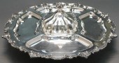 SILVER PLATE ROTATING COVERED