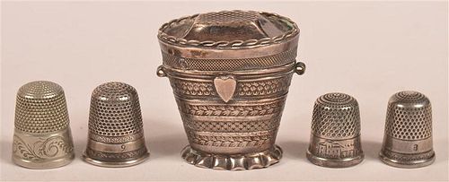 SILVER THIMBLE CASE AND FOUR