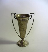 Silver trophy cup    j.e. cald