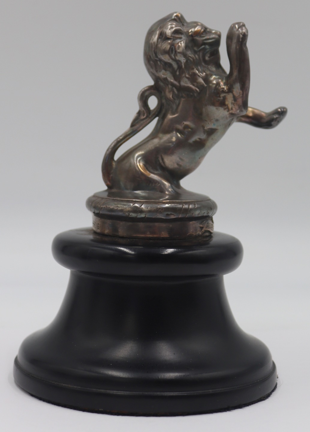 SILVERED CAR MASCOT OF A LION