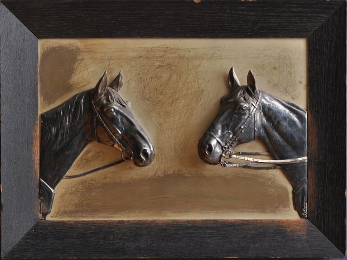 SILVERED TIN RELIEF PLAQUE With two