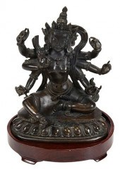 SINO-TIBETAN BRONZE SEATED EKA