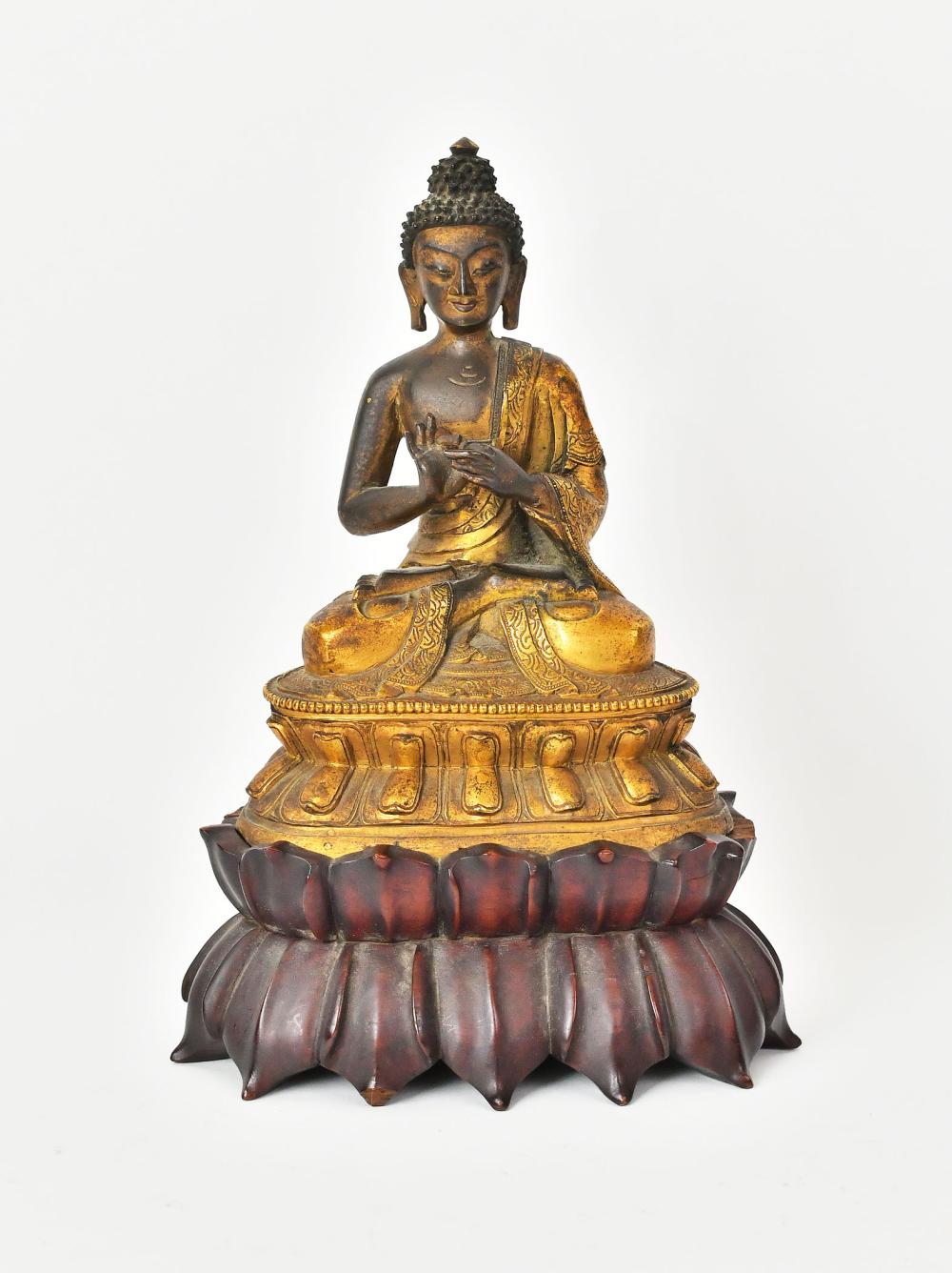 SINO-TIBETAN GILT AND PATINATED
