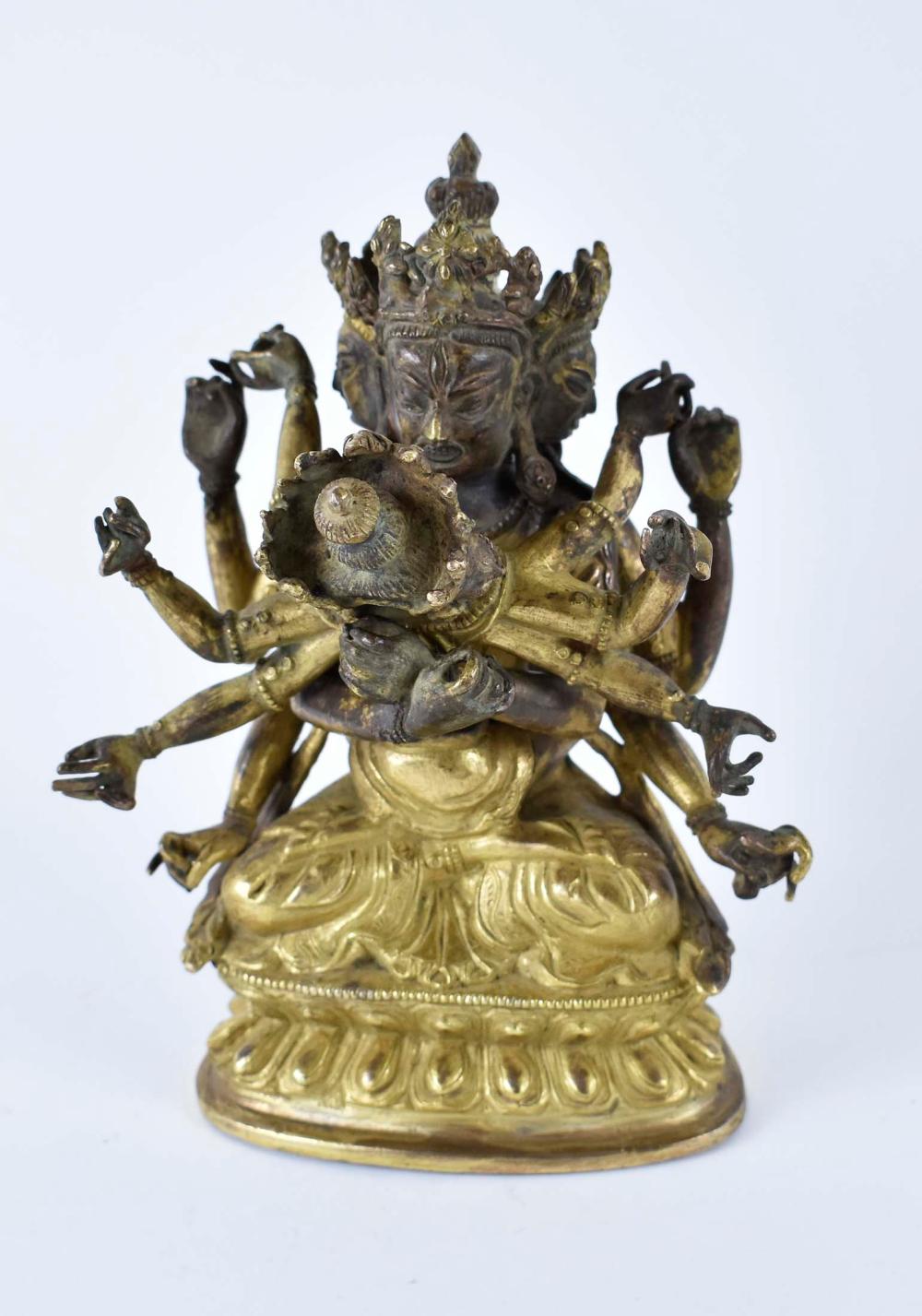 SINO-TIBETAN GILT BRONZE DEITY WITH