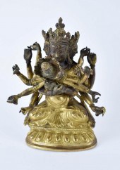 SINO-TIBETAN GILT BRONZE DEITY