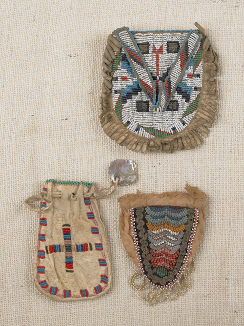 Sioux beaded hide purse with fringe