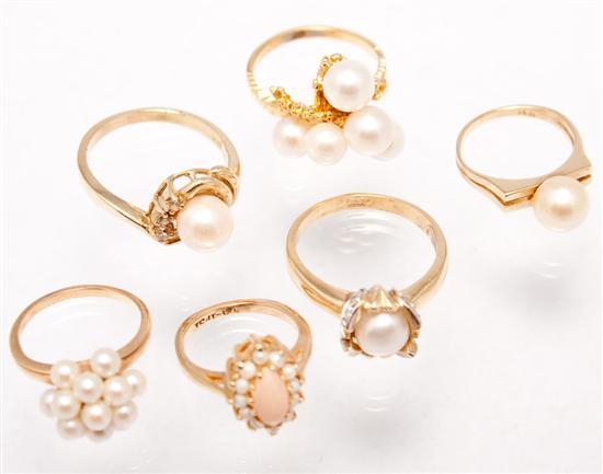 Six 14K yellow gold and pearl rings