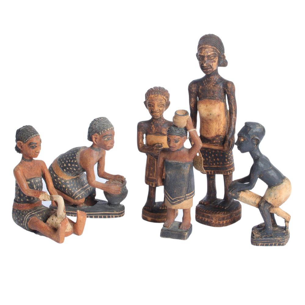 SIX AFRICAN CARVED AND PAINTED FOLK