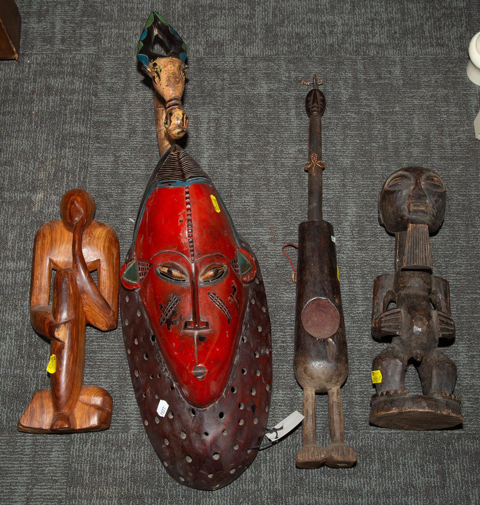 SIX AFRICAN CARVED WOOD ARTIFACTS