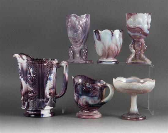 Six amethyst marbled glass articles