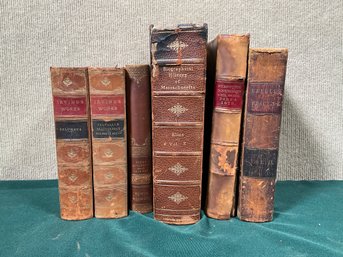 Six antique leather bound books,
