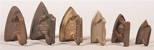 SIX ANTIQUE MINIATURE CAST IRON
