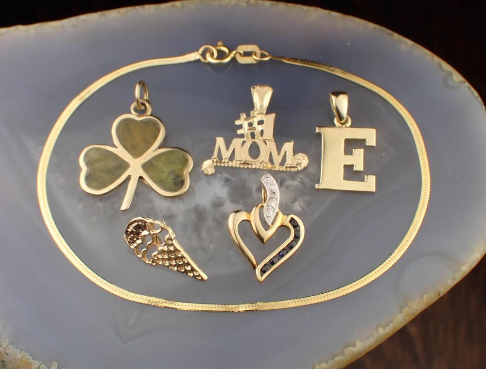 SIX ARTICLES OF YELLOW GOLD