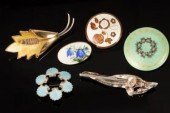 Six assorted brooches to inclu