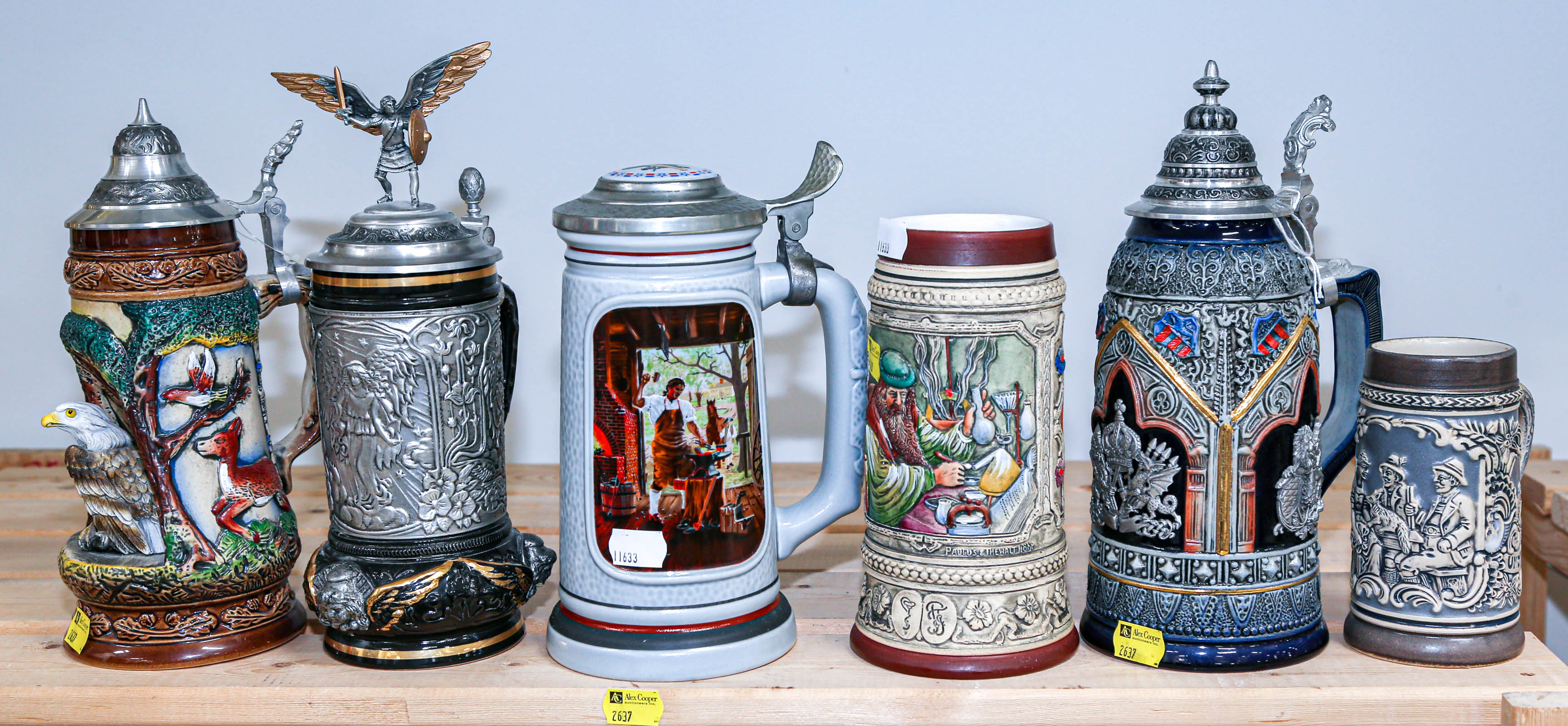 SIX ASSORTED GERMAN STEINS .
