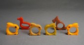 SIX BAKELITE ANIMAL-FORM NAPKI