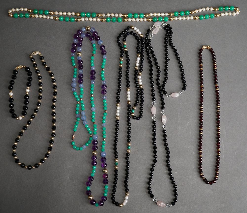 SIX BEADED NECKLACES AND ONE