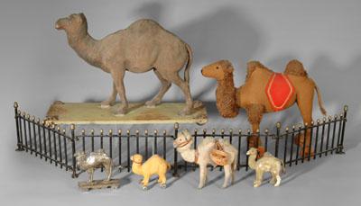 Six camel toys: Steiff camel on