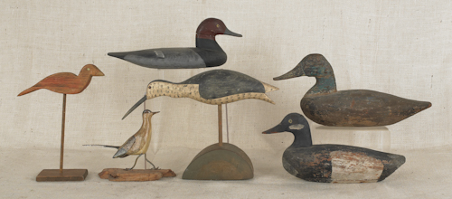 Six carved and painted duck and