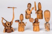 SIX CARVED AND STAINED WOOD KO