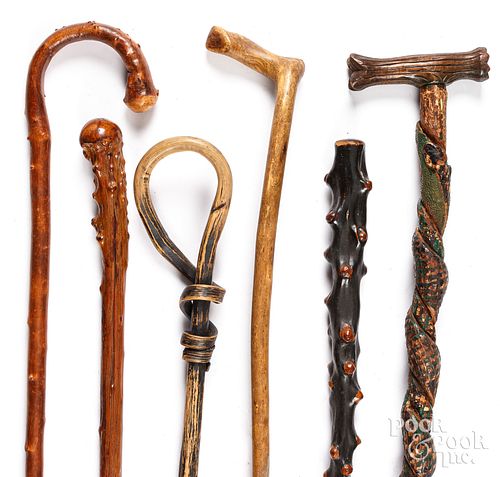 SIX CARVED CANESSix carved canes.