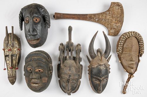 SIX CARVED TRIBAL MASKS AND WAR