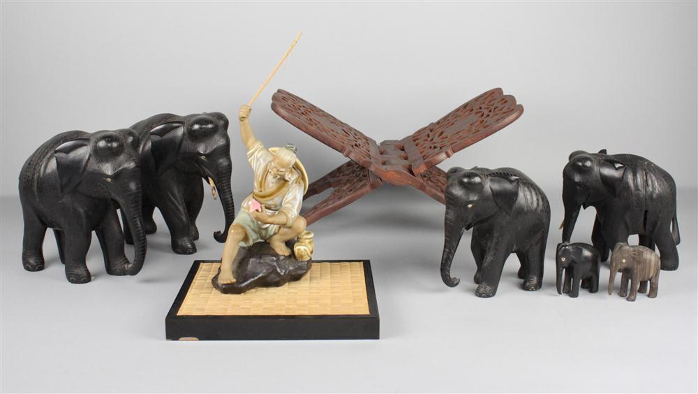 SIX CARVED WOOD ELEPHANTS A CHINESE