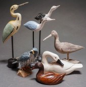 SIX CARVED WOOD FIGURES OF SHO