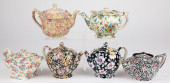 SIX CHINTZ PORCELAIN TEAPOTS,