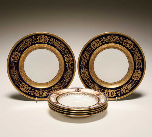 Six Cobalt and gilt porcelain table
