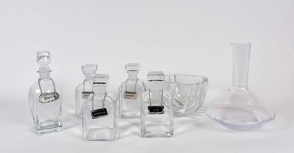 SIX COLORLESS GLASS DECANTERS & A