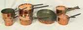 Six copper saucepans with iron