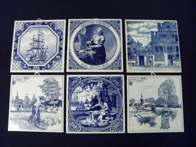 Six Delft blue and white tiles.