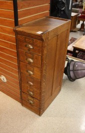 SIX-DRAWER OAK FILE CABINET, A