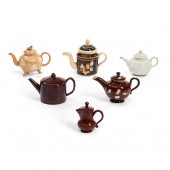 SIX EARLY POTTERY TEA WARES, 1