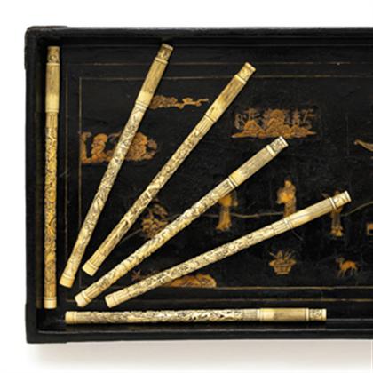 Six elephant ivory covered brushes