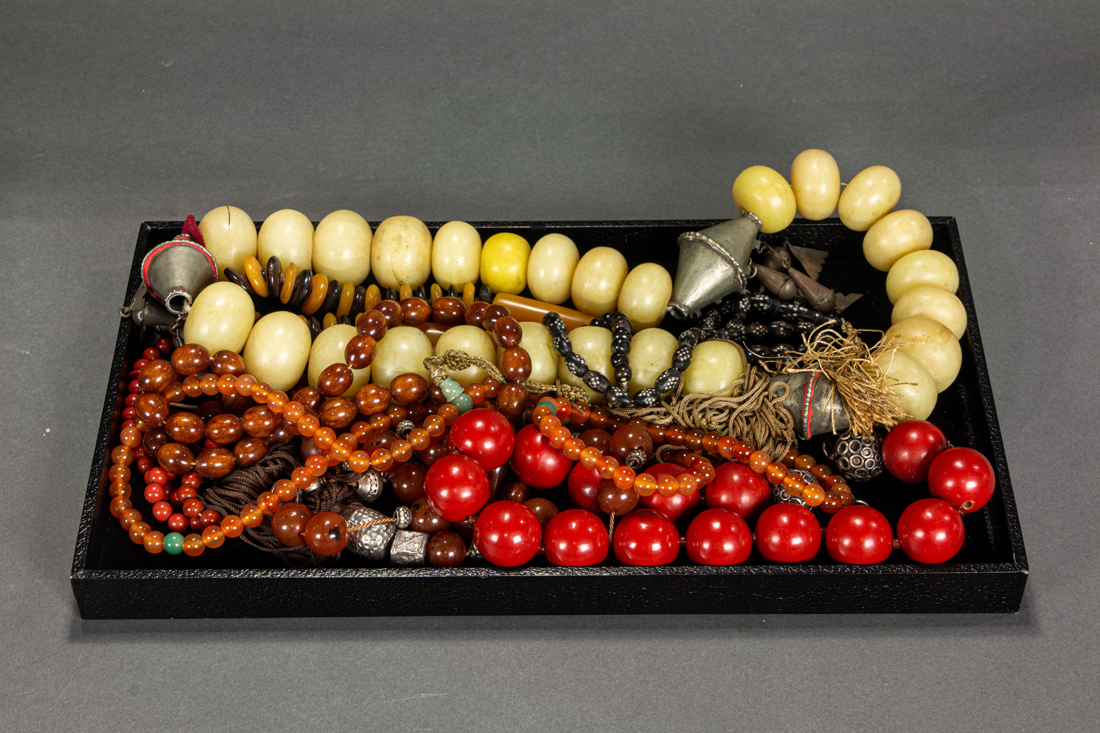 SIX ETHNIC BEADED NECKLACES: