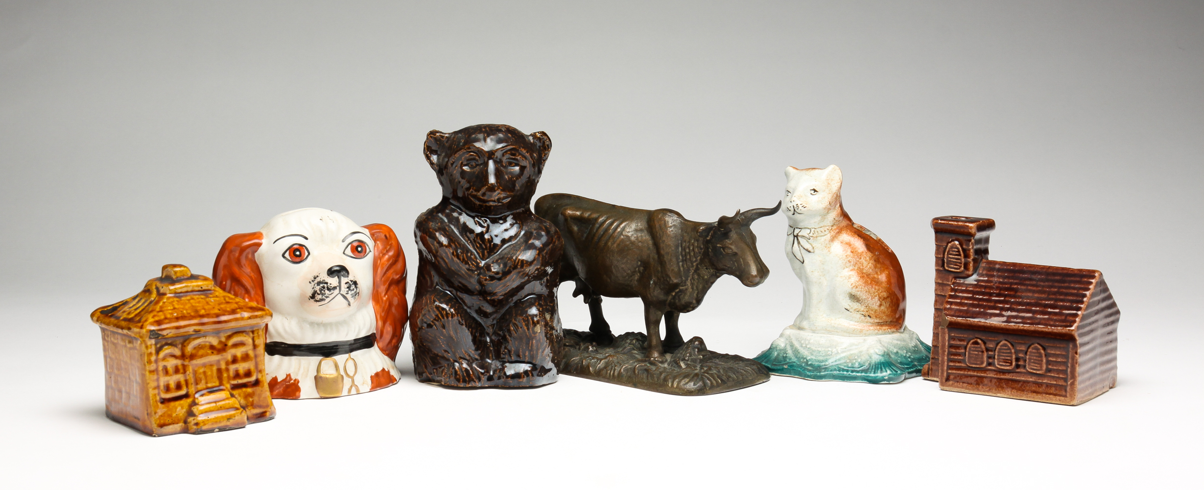 SIX FIGURAL BANKS. American and