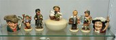SIX FIGURINES. Including four