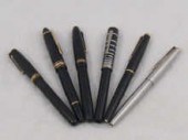 Six fountain pens; a Mont Blan