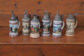 SIX GERMAN STEINS WITH PEWTER