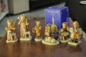 SIX HUMMEL FIGURINES AND A HUM