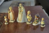 SIX HUMMEL FIGURINES.  German